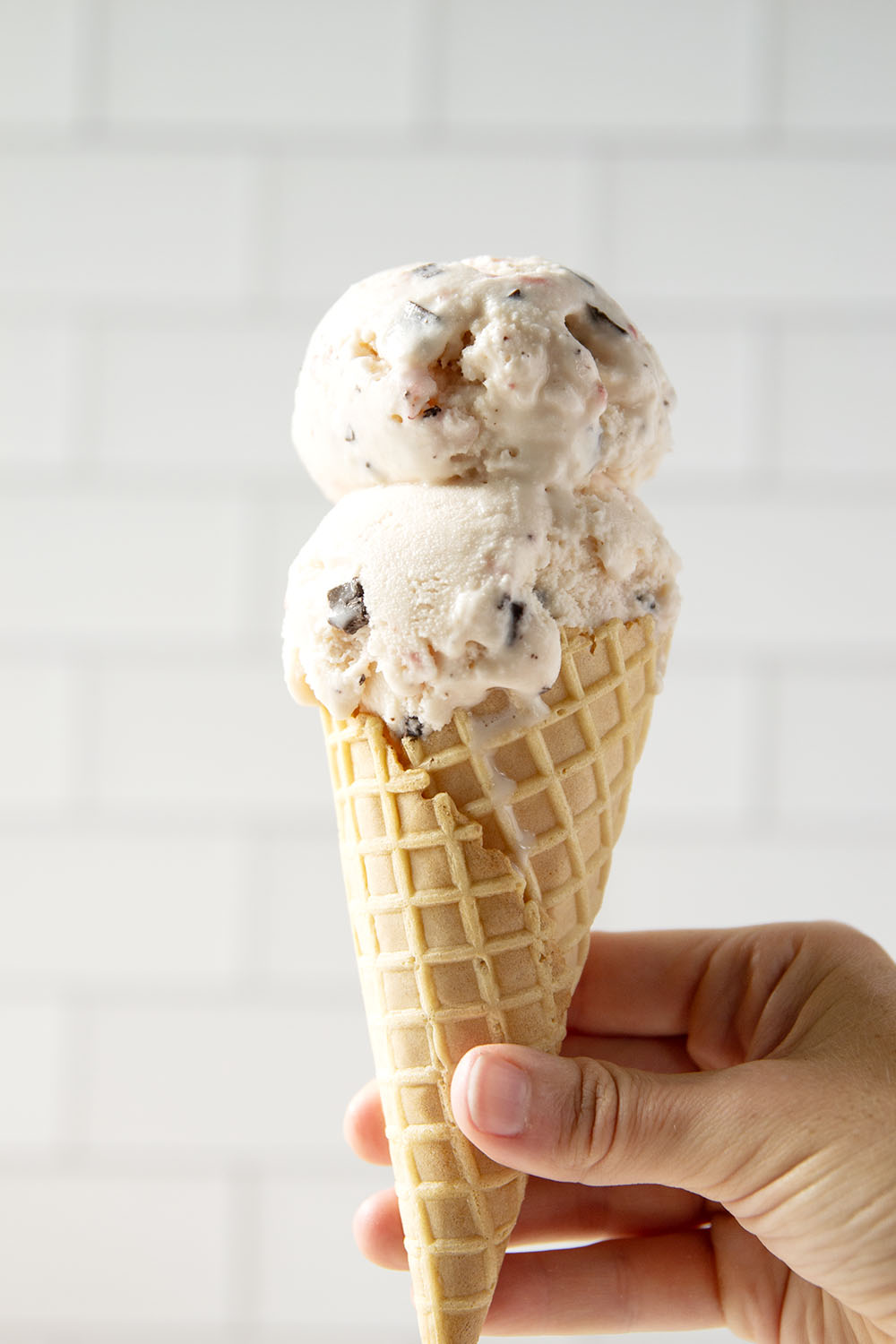 Churned with a fresh strawberry sauce and lots of chocolate chip pieces, this strawberry chocolate chip ice cream is dreamy with fresh summer strawberries!