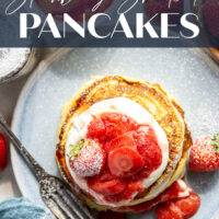 These strawberry shortcake pancakes feature layers of fluffy buttermilk cornmeal pancakes, fresh whipped cream, and lots of juicy fresh strawberry sauce.