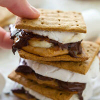 Layered with banana slices, creamy peanut butter, gooey chocolate, and toasted marshmallows, no one will be able to resist these peanut butter banana s'mores!