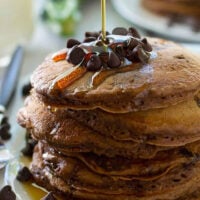 Supremely moist and loaded with a double hit of chocolate, nobody will ever guess that there's zucchini hiding inside these chocolate zucchini pancakes!