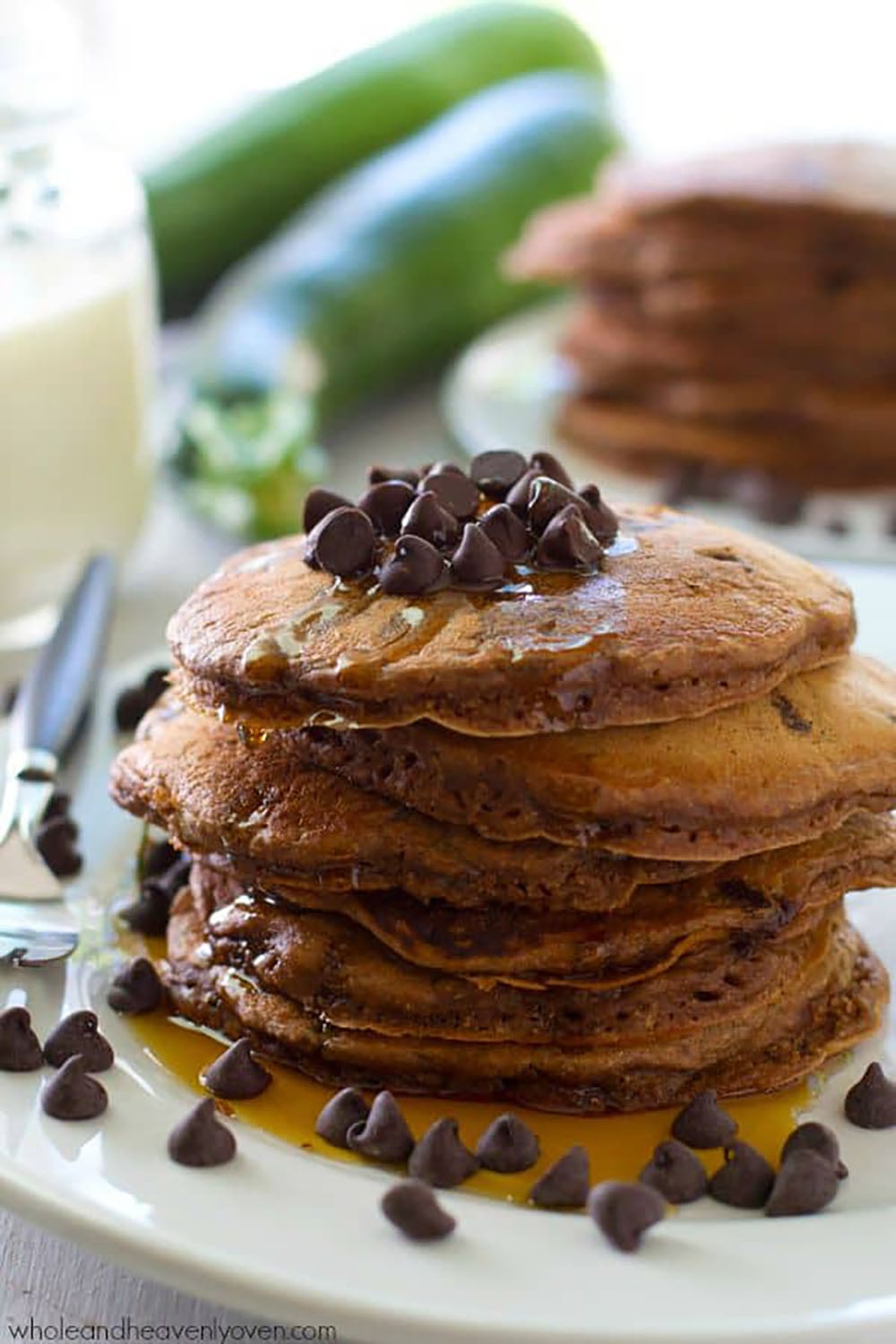 Supremely moist and loaded with a double hit of chocolate, nobody will ever guess that there's zucchini hiding inside these chocolate zucchini pancakes!