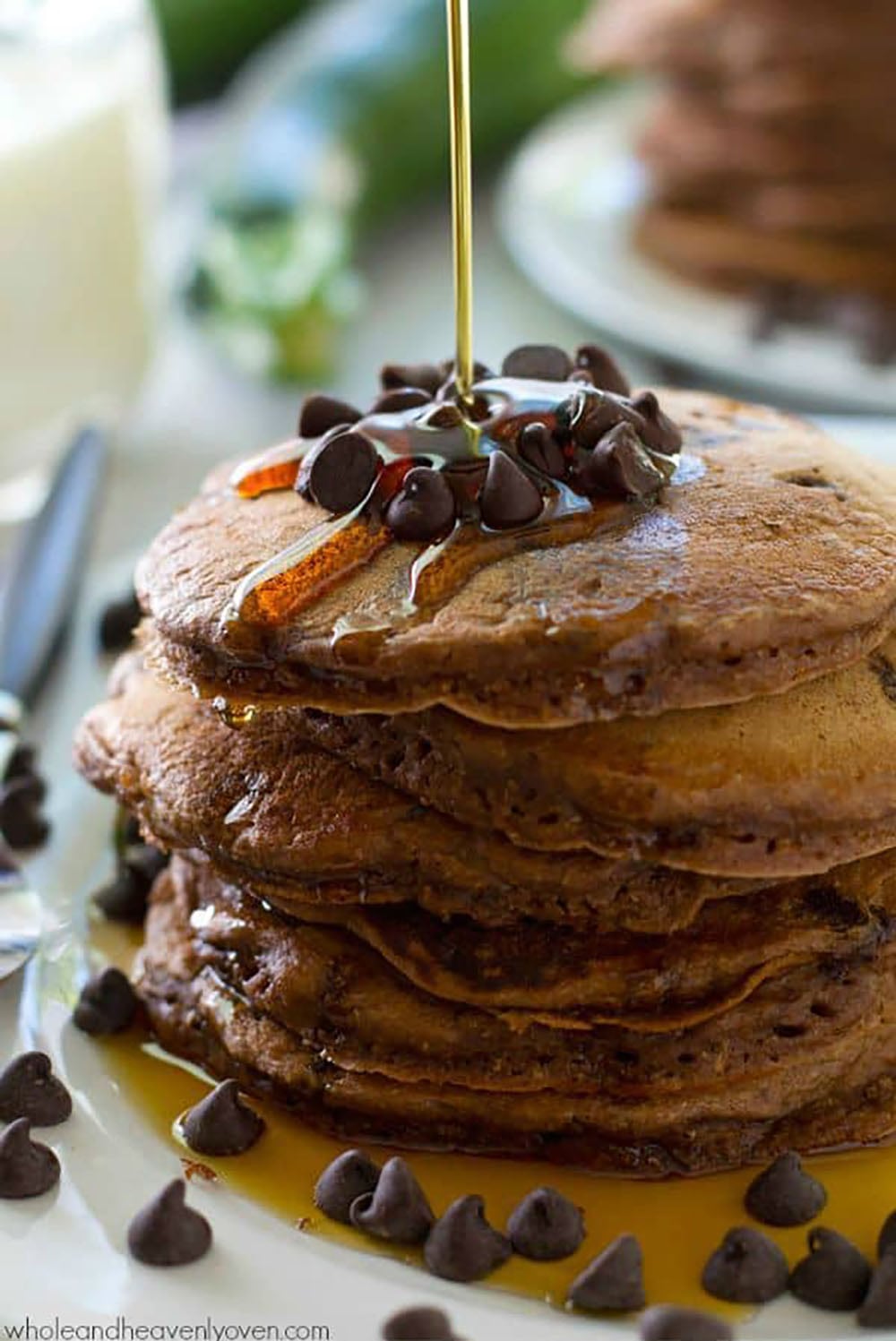 Supremely moist and loaded with a double hit of chocolate, nobody will ever guess that there's zucchini hiding inside these chocolate zucchini pancakes!