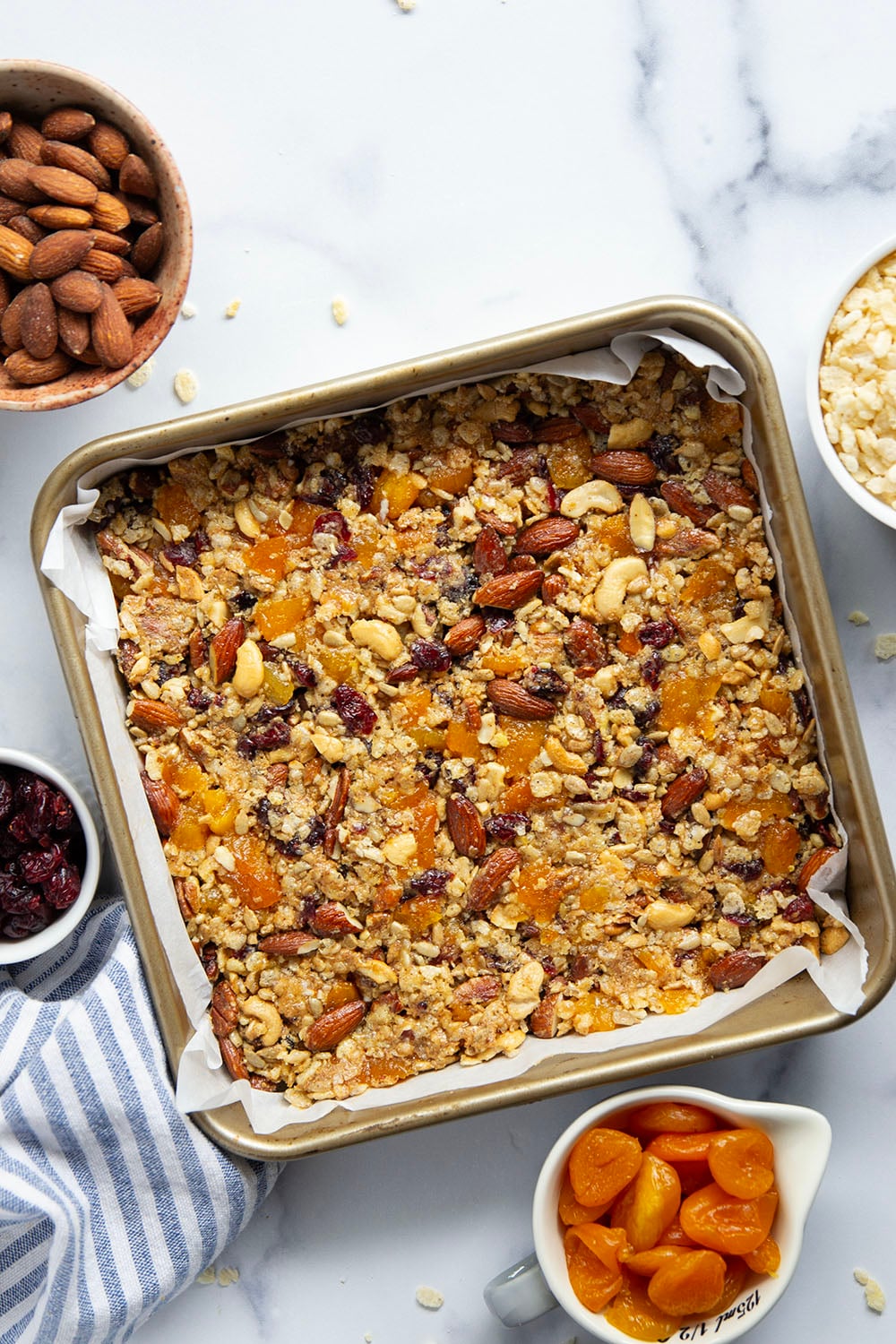 These fruit and nut bars are a breeze to whip up with no baking required and are chock full of texture from 3 kinds of nuts and lots of dried fruit.