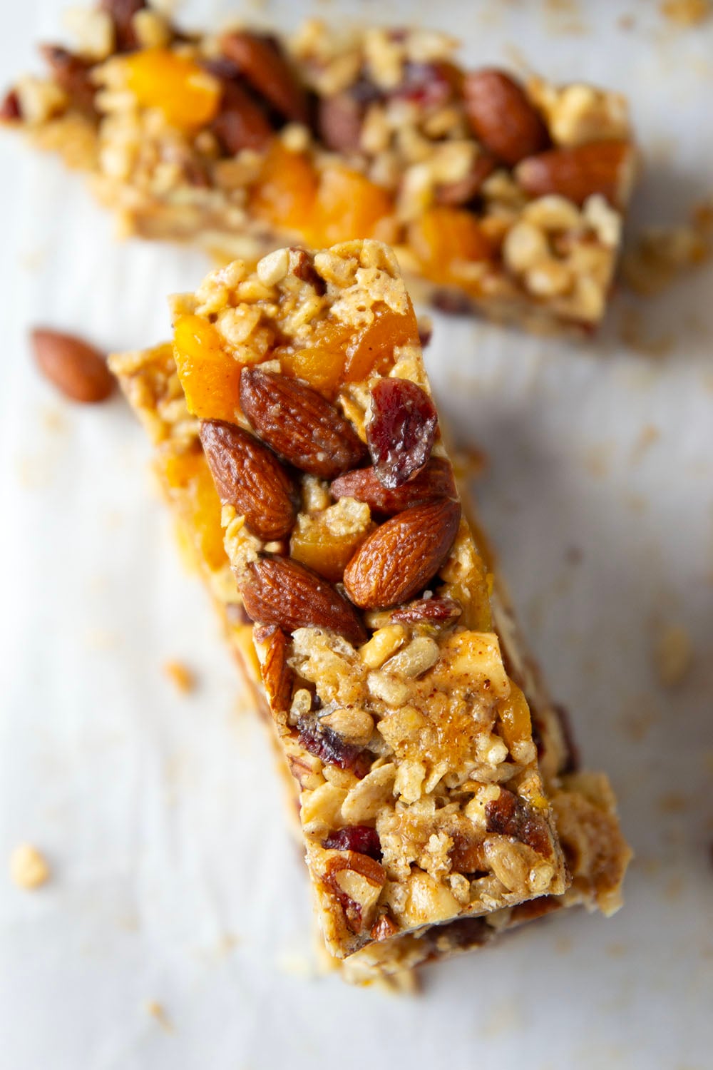 These fruit and nut bars are a breeze to whip up with no baking required and are chock full of texture from 3 kinds of nuts and lots of dried fruit.