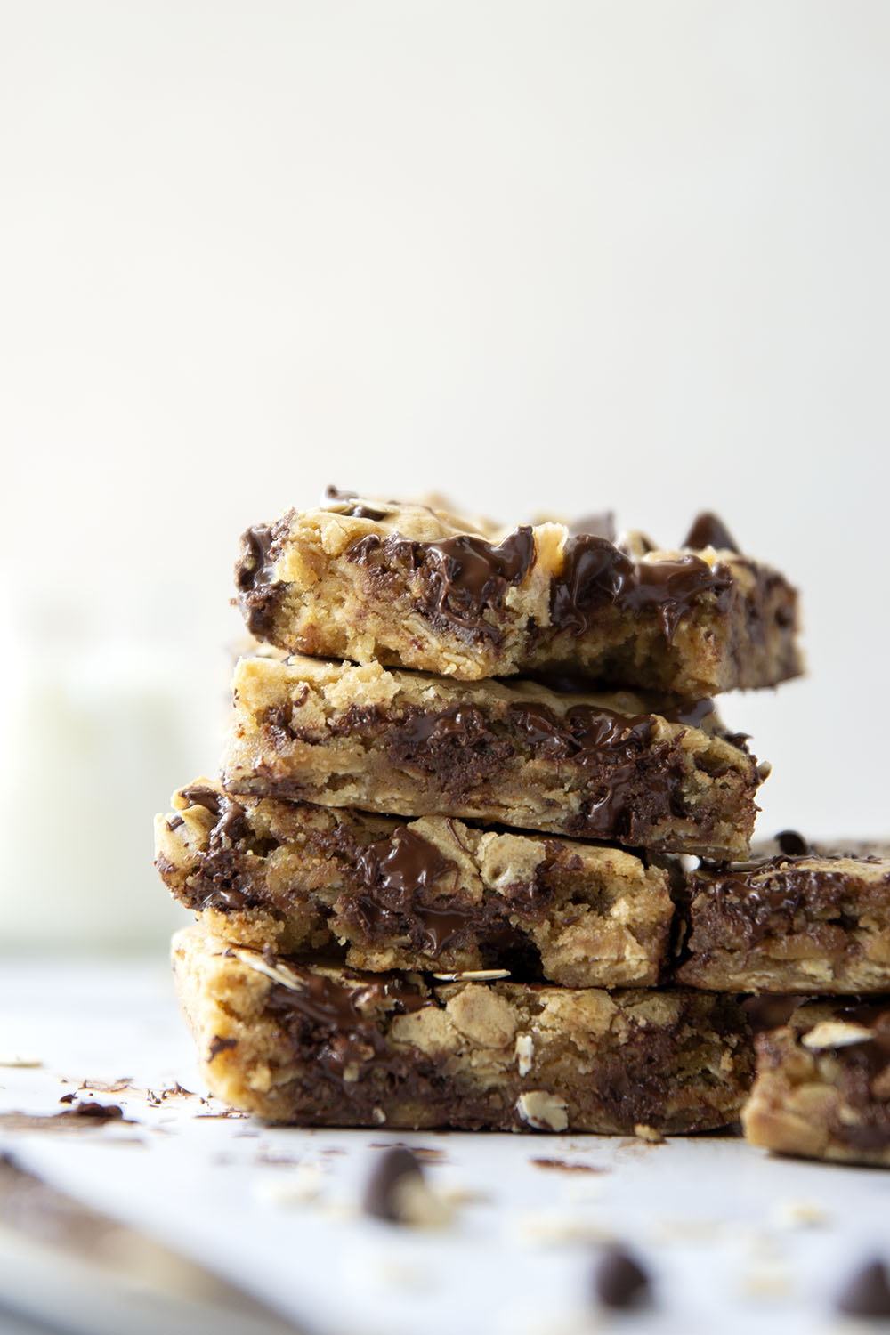 Jam-packed with tender oats and plenty of gooey chocolate, these oatmeal chocolate chip cookie bars have a soft and chewy texture thanks to browned butter and bake up in only 30 minutes.