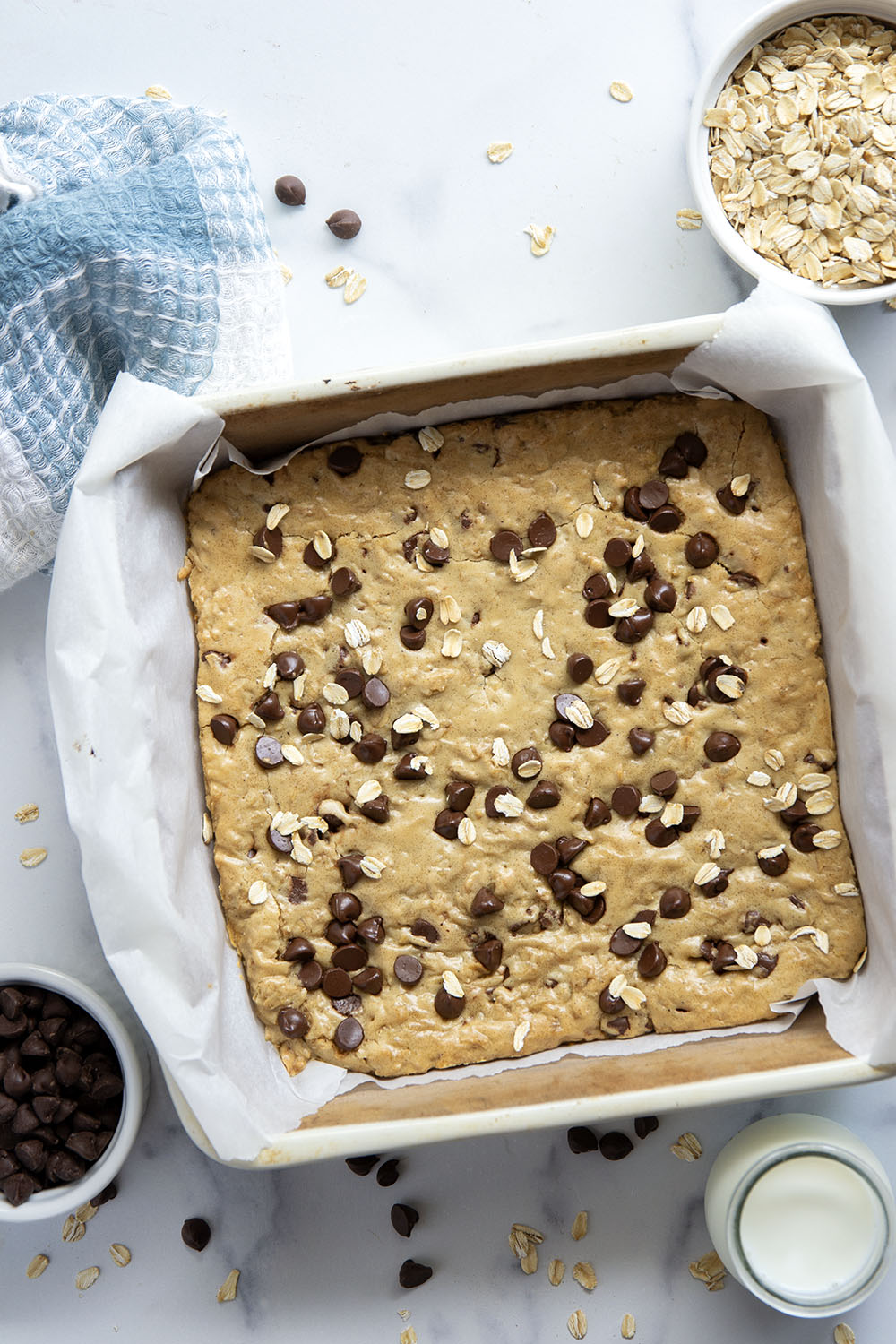 Jam-packed with tender oats and plenty of gooey chocolate, these oatmeal chocolate chip cookie bars have a soft and chewy texture thanks to browned butter and bake up in only 30 minutes.