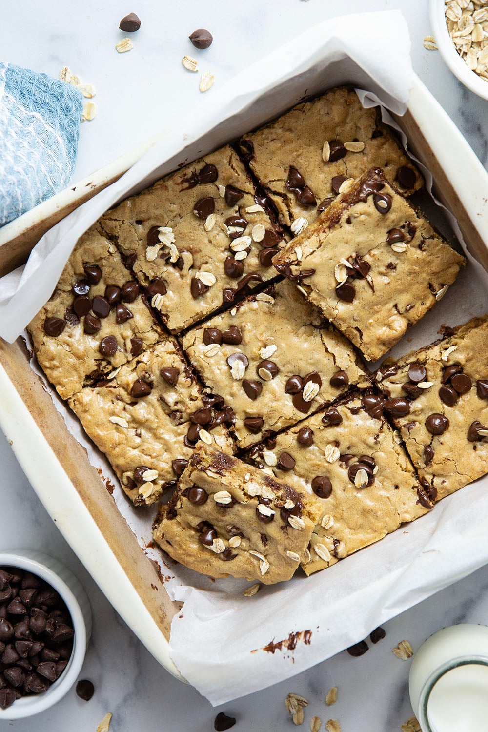 Jam-packed with tender oats and plenty of gooey chocolate, these oatmeal chocolate chip cookie bars have a soft and chewy texture thanks to browned butter and bake up in only 30 minutes.