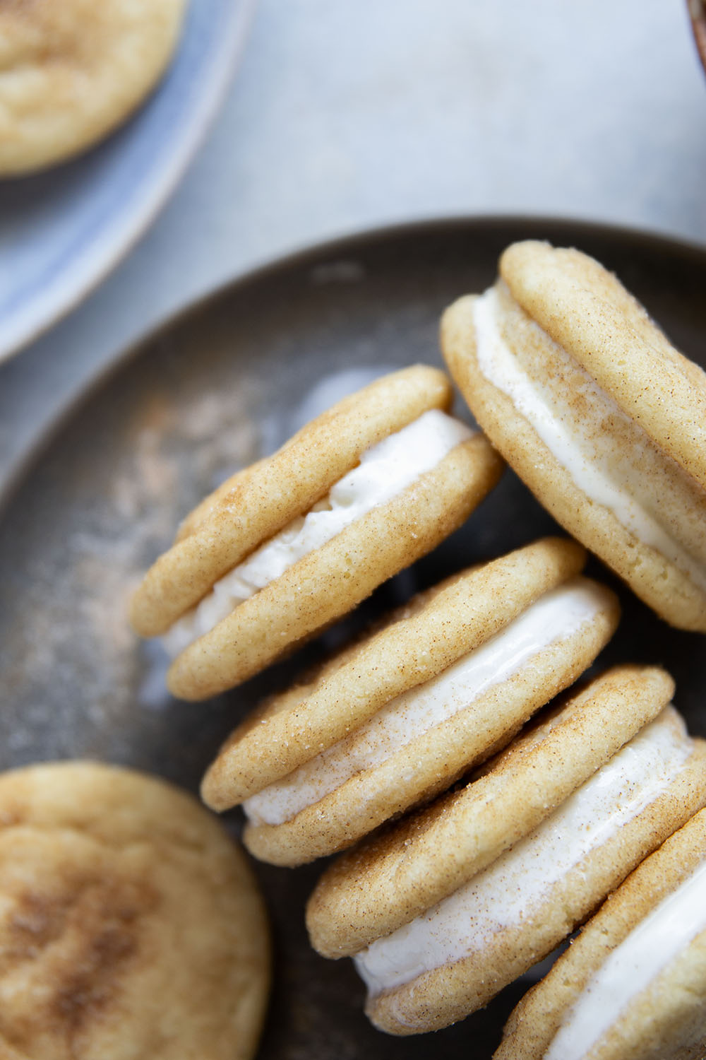 These snickerdoodle ice cream sandwiches feature creamy vanilla ice cream sandwiched between soft homemade snickerdoodles to create the ultimate frozen treat.