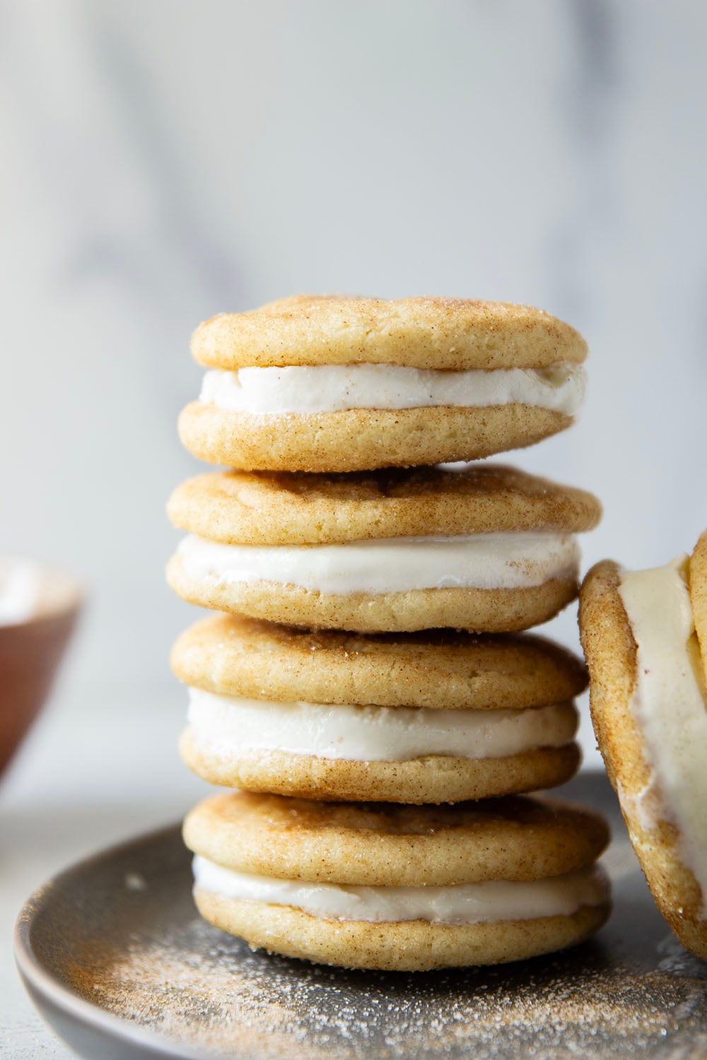 These snickerdoodle ice cream sandwiches feature creamy vanilla ice cream sandwiched between soft homemade snickerdoodles to create the ultimate frozen treat.