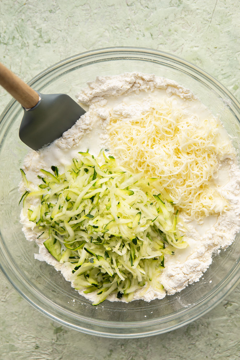 You'd never guess that these light and flaky biscuits are loaded up with shredded zucchini! Paired with nutty Parmesan, these zucchini biscuits are definitely a keeper summer recipe.