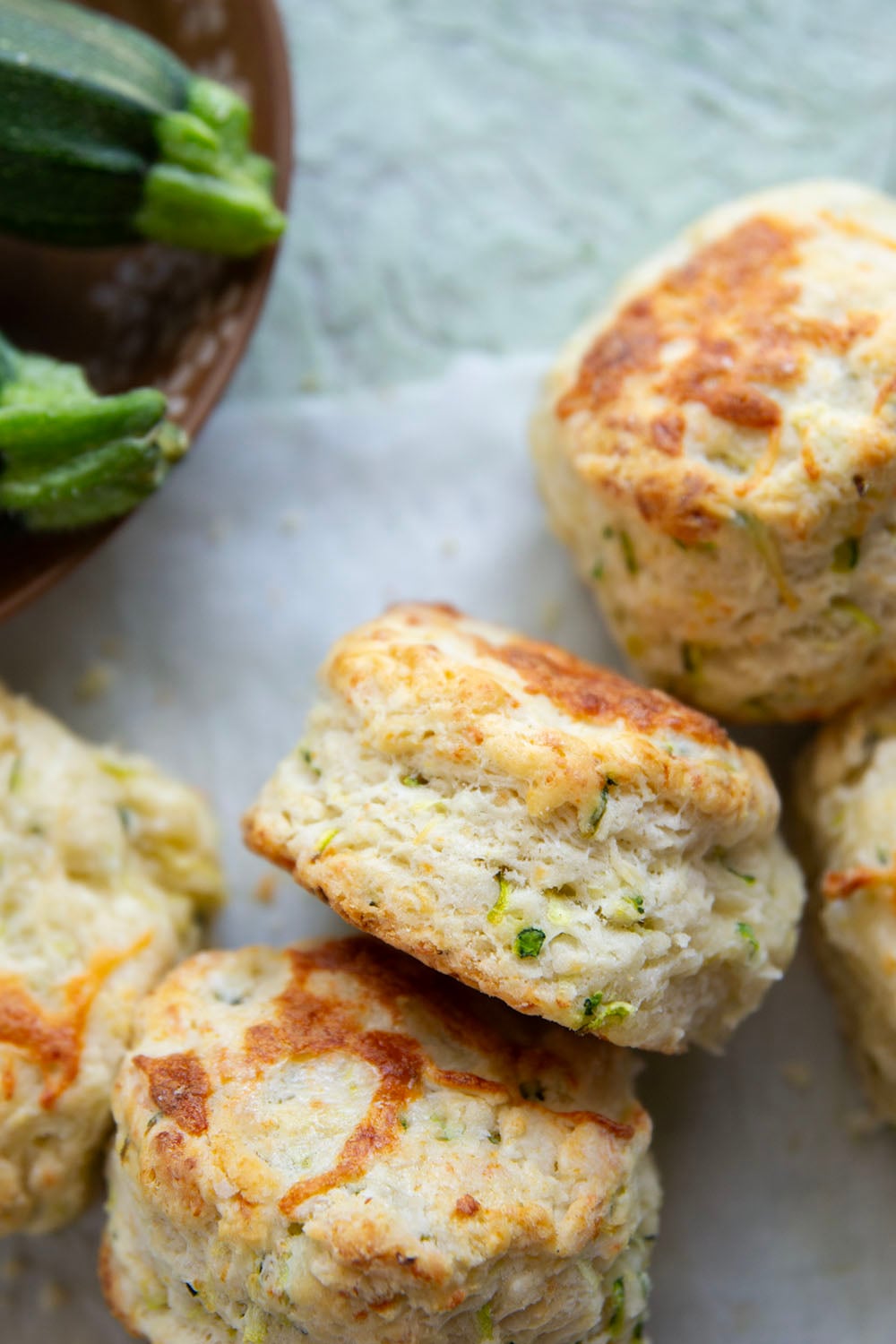 You'd never guess that these light and flaky biscuits are loaded up with shredded zucchini! Paired with nutty Parmesan, these zucchini biscuits are definitely a keeper summer recipe.