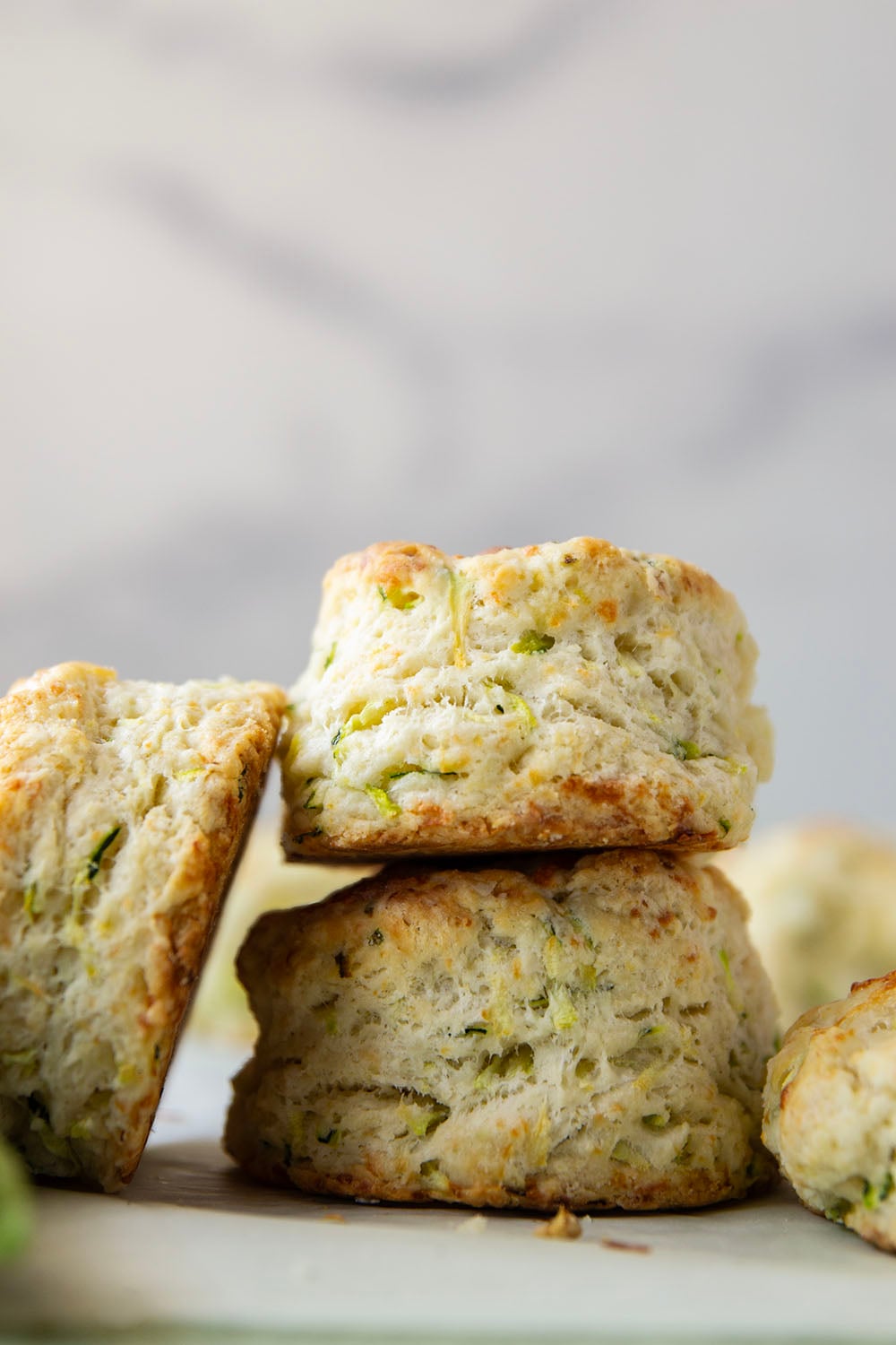 You'd never guess that these light and flaky biscuits are loaded up with shredded zucchini! Paired with nutty Parmesan, these zucchini biscuits are definitely a keeper summer recipe.