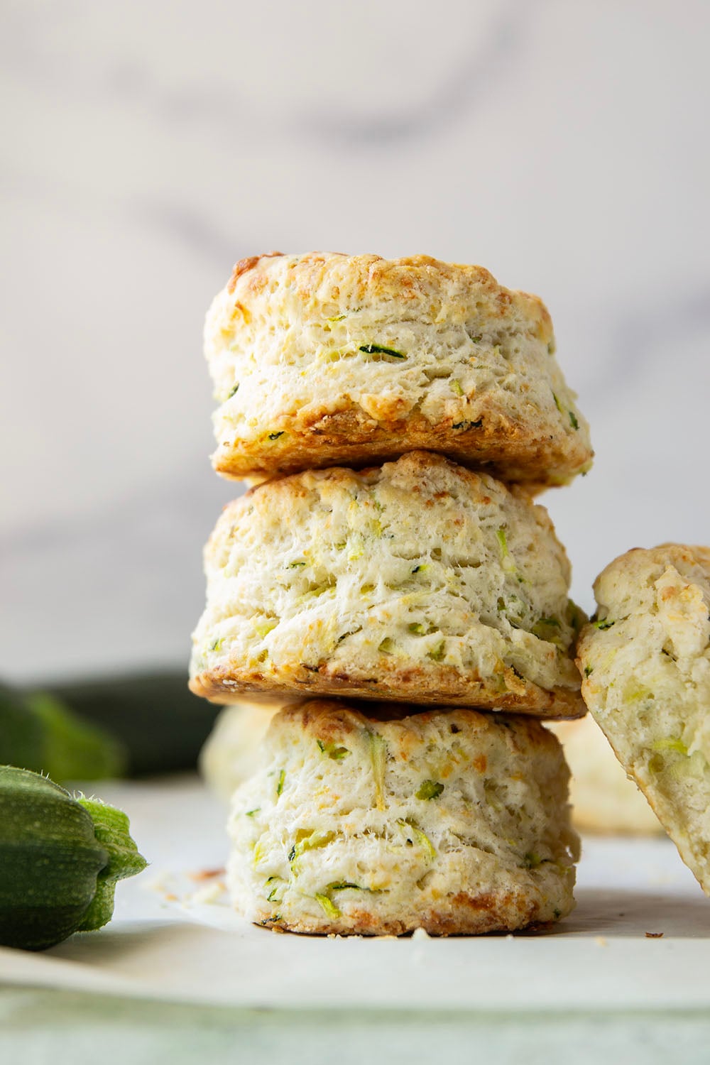 You'd never guess that these light and flaky biscuits are loaded up with shredded zucchini! Paired with nutty Parmesan, these zucchini biscuits are definitely a keeper summer recipe.