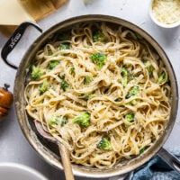 This broccoli fettuccine alfredo is ready in a snap and features tender broccoli florets and pasta in a rich Parmesan alfredo sauce.