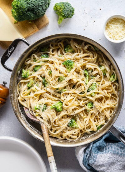 This broccoli fettuccine alfredo is ready in a snap and features tender broccoli florets and pasta in a rich Parmesan alfredo sauce.