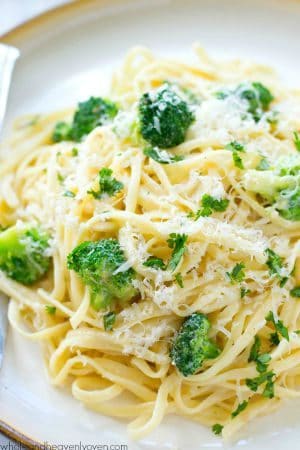 This ultra-creamy fettuccine alfredo is so comforting it will blow your mind that it comes together in only 20 minutes! Paired with tender broccoli florets and plenty of Parmesan makes for one impressive dinner!