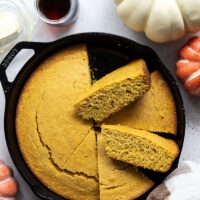Plenty of fall spices and pumpkin collide in this soft and perfectly spiced pumpkin cornbread that pairs like a dream with a bowl of chili!