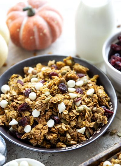 This crisp pumpkin granola has a delightful fall twist of warming spices, real pumpkin puree, white chocolate, and dried cranberries.