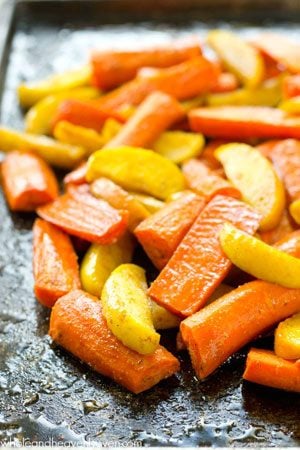 Roasted in maple syrup and tons of zingy Moroccan spices, these roasted carrots and apples are an easy yet elegant addition to any fall dinner!