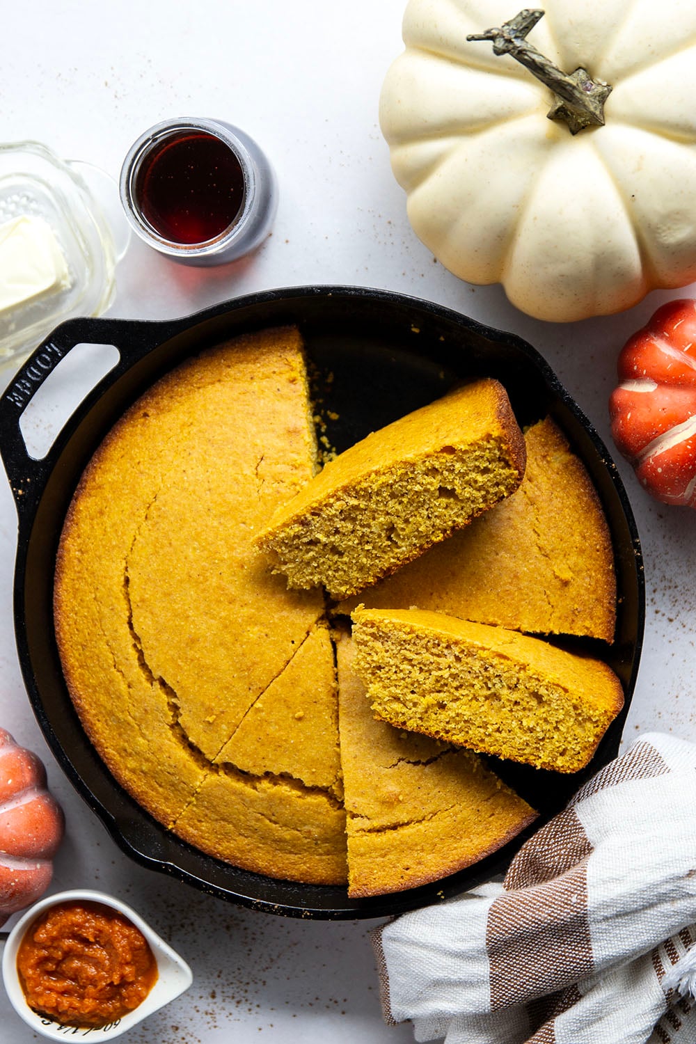Plenty of fall spices and pumpkin collide in this soft and perfectly spiced pumpkin cornbread that pairs like a dream with a bowl of chili!