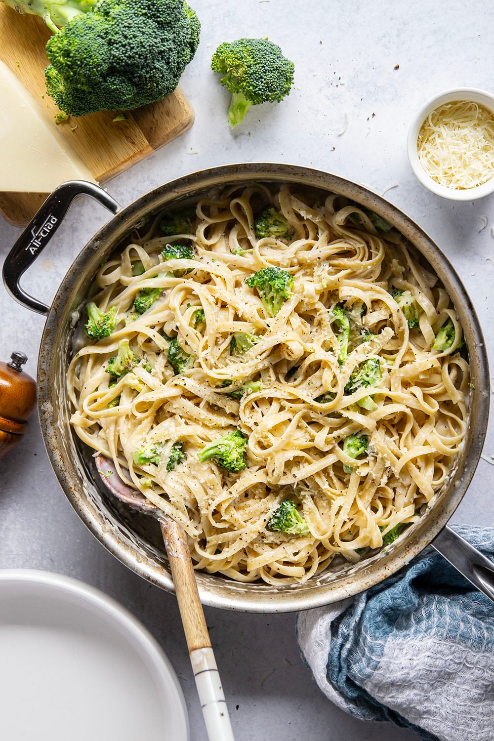 This broccoli fettuccine alfredo is ready in a snap and features tender broccoli florets and pasta in a rich Parmesan alfredo sauce.