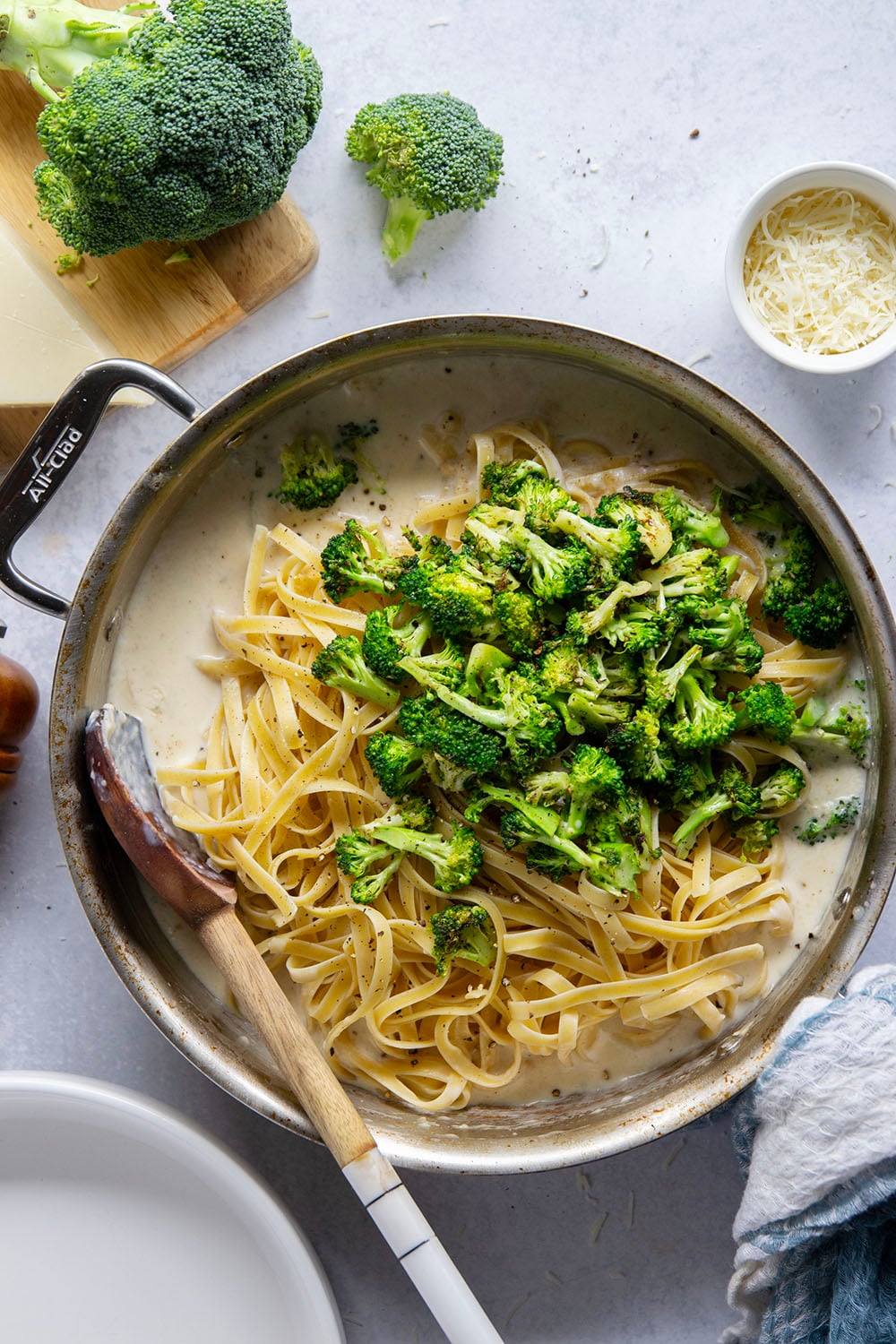 This broccoli fettuccine alfredo is ready in a snap and features tender broccoli florets and pasta in a rich Parmesan alfredo sauce.