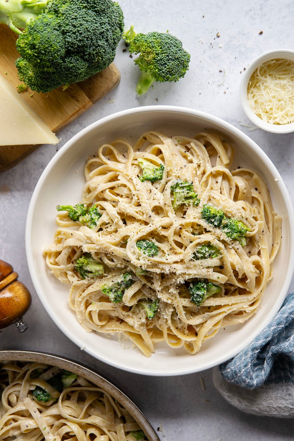 This broccoli fettuccine alfredo is ready in a snap and features tender broccoli florets and pasta in a rich Parmesan alfredo sauce.