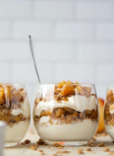 Add a little fun to your fall breakfast, with these apple crisp parfaits! They whip up in less than 10 minutes and are layered with crunchy granola, caramelized apples, and creamy vanilla yogurt.