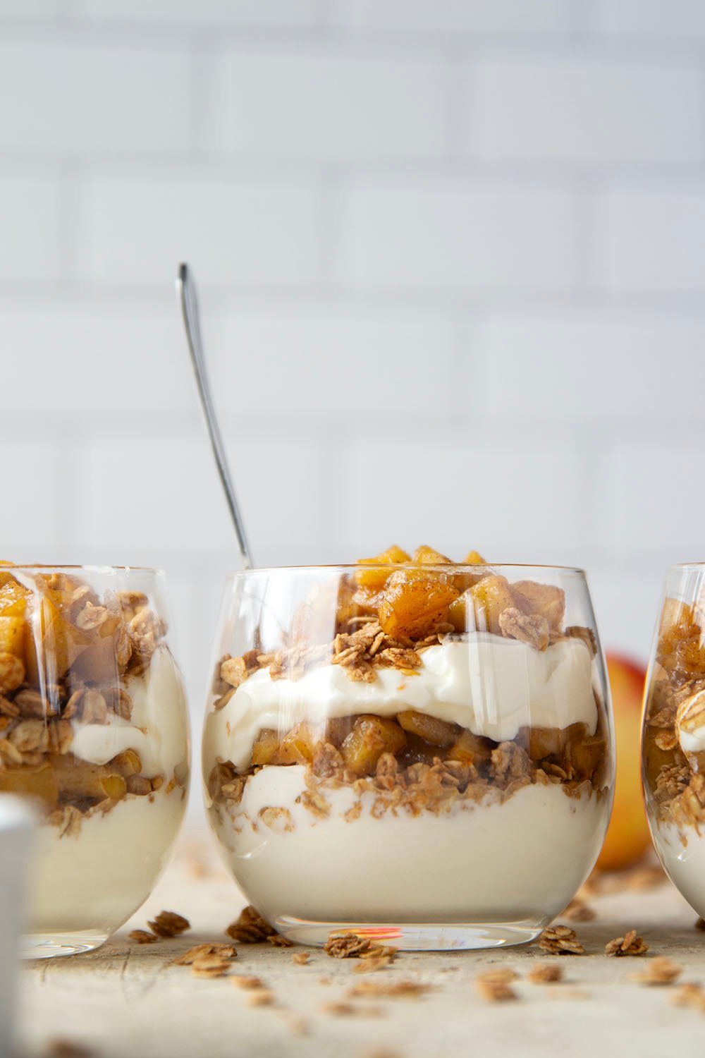 Add a little fun to your fall breakfast, with these apple crisp parfaits! They whip up in less than 10 minutes and are layered with crunchy granola, caramelized apples, and creamy vanilla yogurt.