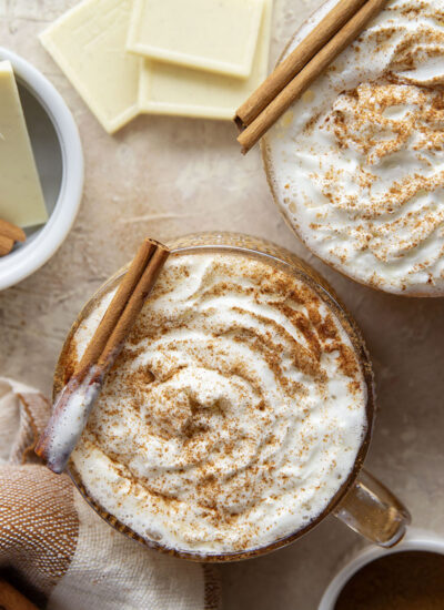 White chocolate and warming chai spices make for the perfect winter sipper in this cozy slow cooker white hot chocolate!