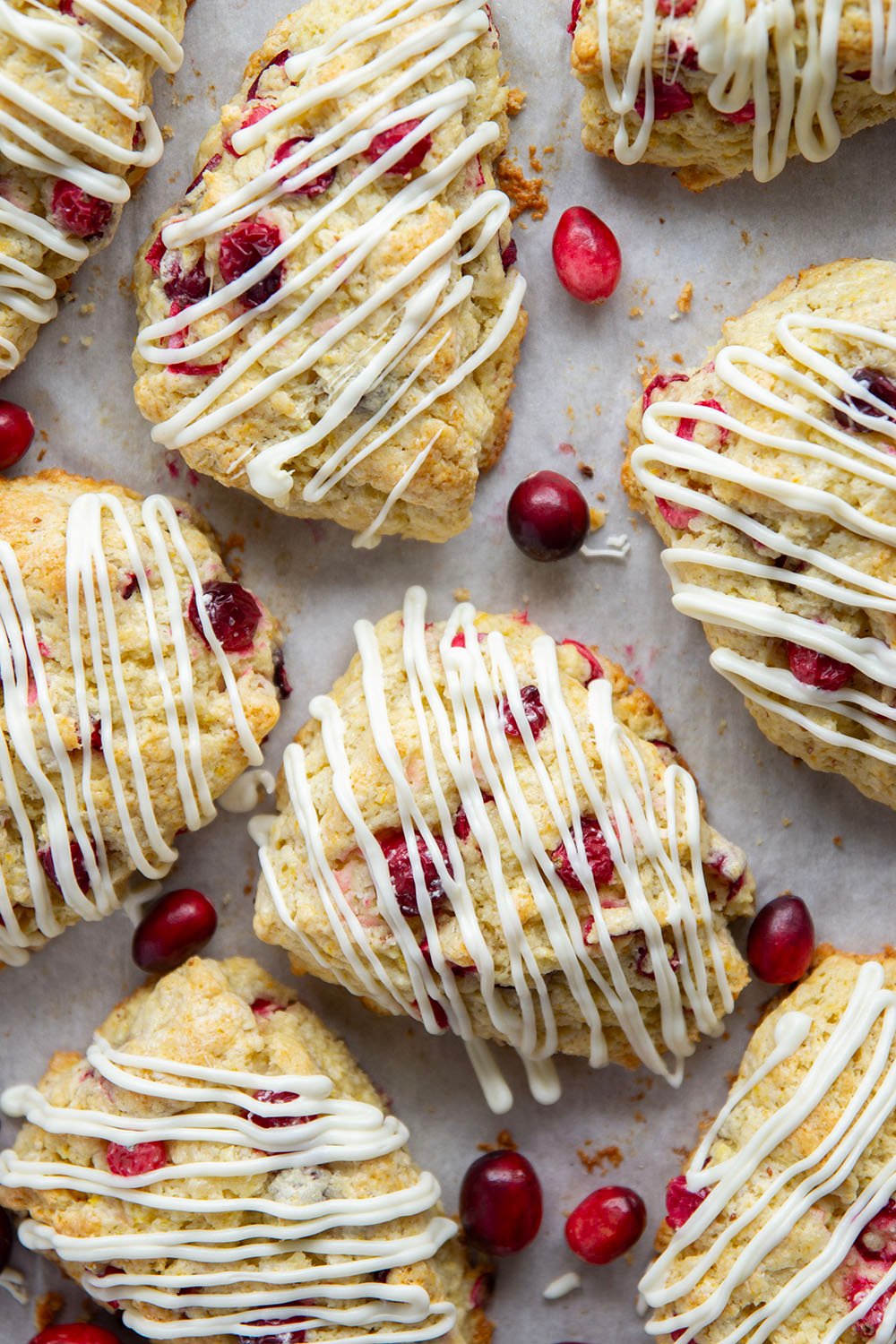 Juicy tart cranberries and a thick drizzle of white chocolate are the perfect holiday pairing in these flaky white chocolate cranberry scones.