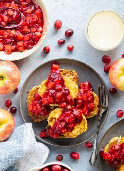 This eggnog French toast is a quick and easy holiday breakfast that always pleases! A warm cranberry apple sauce pairs perfectly on top rich slices.