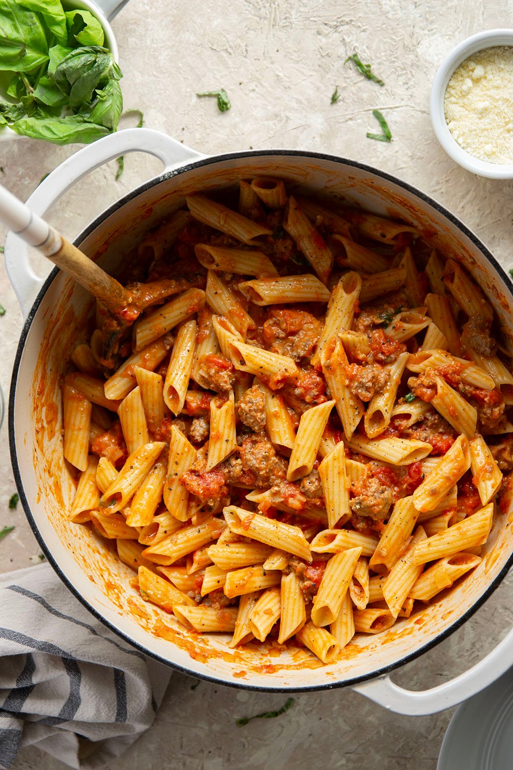 Penne alla vodka with sausage features a flavorful homemade vodka tomato sauce with juicy browned sausage. - an easy weeknight dinner that's ready in under an hour!
