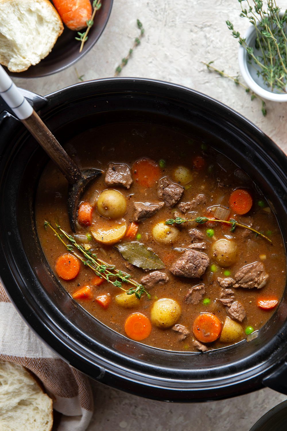 Packed with fall-apart tender beef and lots of hearty vegetables, this easy slow cooker beef stew is the coziest hands-off dinner!