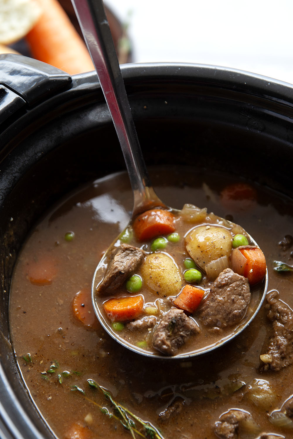 Packed with fall-apart tender beef and lots of hearty vegetables, this easy slow cooker beef stew is the coziest hands-off dinner!