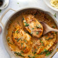 Flavorful white wine and tender sun-dried tomatoes make for a luxuriously creamy sauce in this white wine sun-dried tomato chicken that comes together in minutes and is fantastic served over angel hair.
