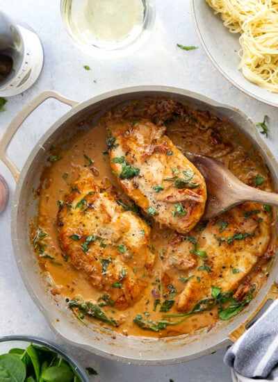 Flavorful white wine and tender sun-dried tomatoes make for a luxuriously creamy sauce in this white wine sun-dried tomato chicken that comes together in minutes and is fantastic served over angel hair.