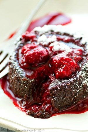 Exploding with a warm, gooey chocolate filling, and covered in a tangy raspberry sauce, these stunning chocolate lava cakes are the perfect treat for you and your sweetheart!