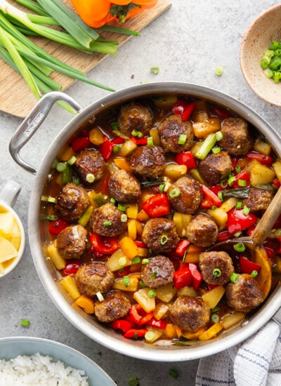 A homemade sweet and sour sauce coats every inch of these juicy sweet and sour meatballs that cook up with colorful peppers and sweet pineapple all in one pan.