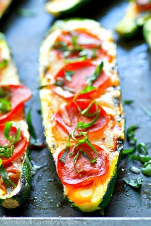 The healthiest form of pizza you'll ever have! These grilled zucchini boats only need 6 ingredients and 20 minutes of your time to throw together and they'll definitely satisfy that pizza craving!