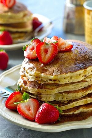 These super-fluffy power pancakes are packed with a huge punch of healthy protein and are insanely amazing with a warm chai spice maple syrup drizzled on top!
