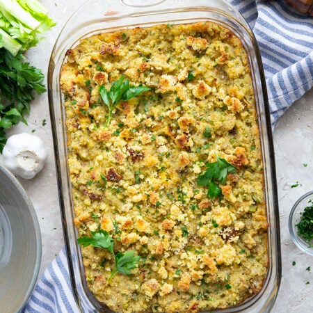My mom's recipe for cornbread stuffing is an essential side dish on our Thanksgiving table and you'll soon see why it's the best ever! Super moist and flavorful and the perfect accompaniment to any turkey dinner.