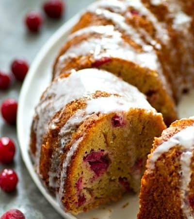 Jam-packed with cranberries, orange flavor, and tons of eggnog glaze, this stunning bundt cake is so simple to mix up for a last-minute holiday dessert and you'll be eating every last crumb!