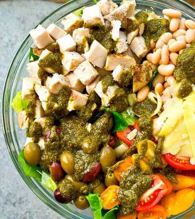 This Tuscan-style turkey salad is loaded with so much fresh healthy goodness and a simple pesto vinaigrette adds an unbelievable amount of flavor!