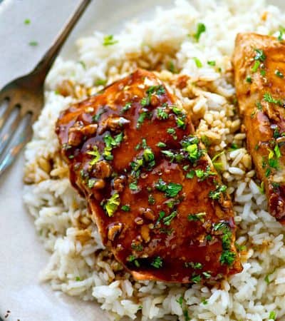 The BEST teriyaki salmon ever made completely from scratch in one skillet and served with fluffy gingered rice and lots of homemade teriyaki sauce!