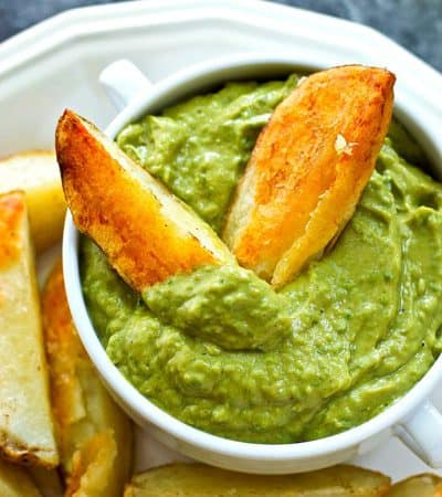 These crispiest-EVER baked potato wedges only need FIVE ingredients and are so easy to throw together! They're ridiculously good dipped in a spicy poblano avocado ranch dip.