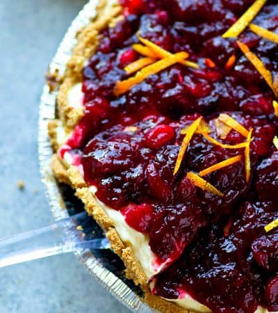 Completely no-bake and thrown together in MINUTES this pretty cranberry orange cheesecake pie is the easiest festive dessert to whip up this holiday season!