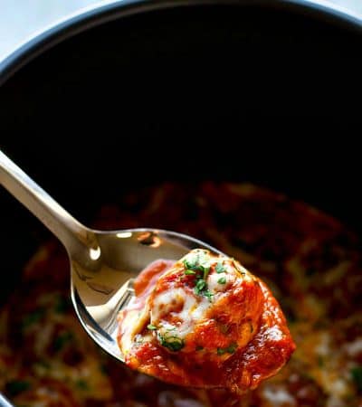 These chicken Parmesan meatballs are 10x easier than the traditional version and they're made in mere MINUTES in the instant pot! Just add hot spaghetti and dinner is good to go.