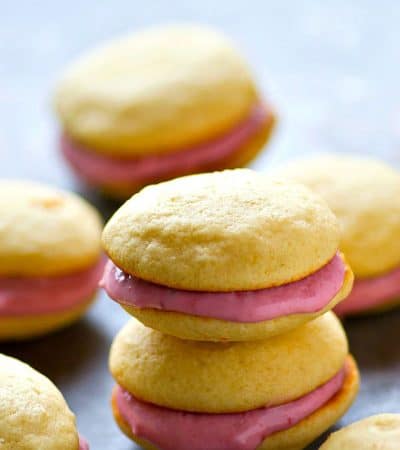 Soft, cake-like vanilla cookies and a tangy raspberry cream cheese filling are the perfect match in these insanely gorgeous whoopie pies! There's no stopping at only one.