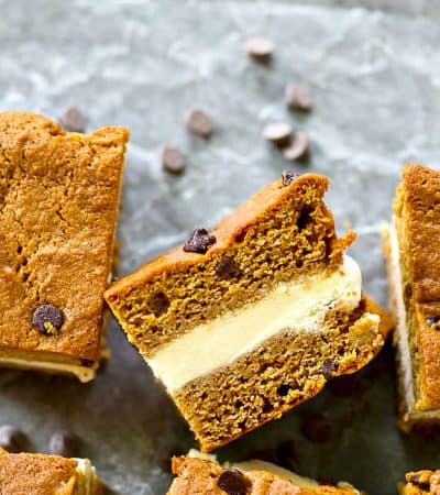 A thick layer of creamy vanilla ice cream is sandwiched between soft homemade chocolate chip blondies for the ultimate twist on ice cream sandwich bars!